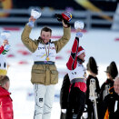 King Harald presents prizes to Petter Northug and the other medalists after the 50 km (Photo: Gorm Kallestad / Scanpix)